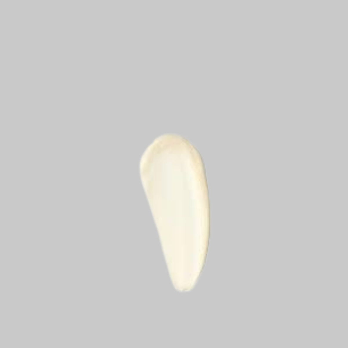 Pale yellow swatch showing the texture of Agent Nateur Holi (Lift) serum.