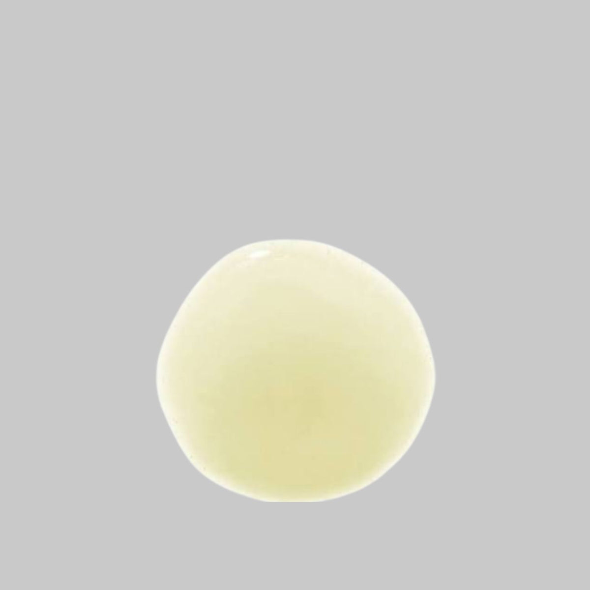 Pale yellow texture swatch of Agent Nateur Holi (Glow) Ageless Eye Serum.