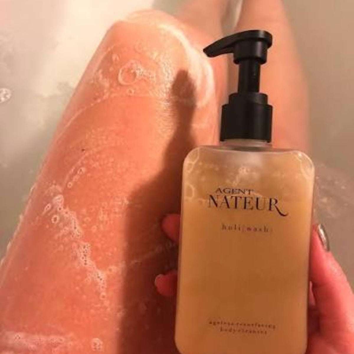 Agent Nateur Holi Wash body cleanser bottle In a bathroom 