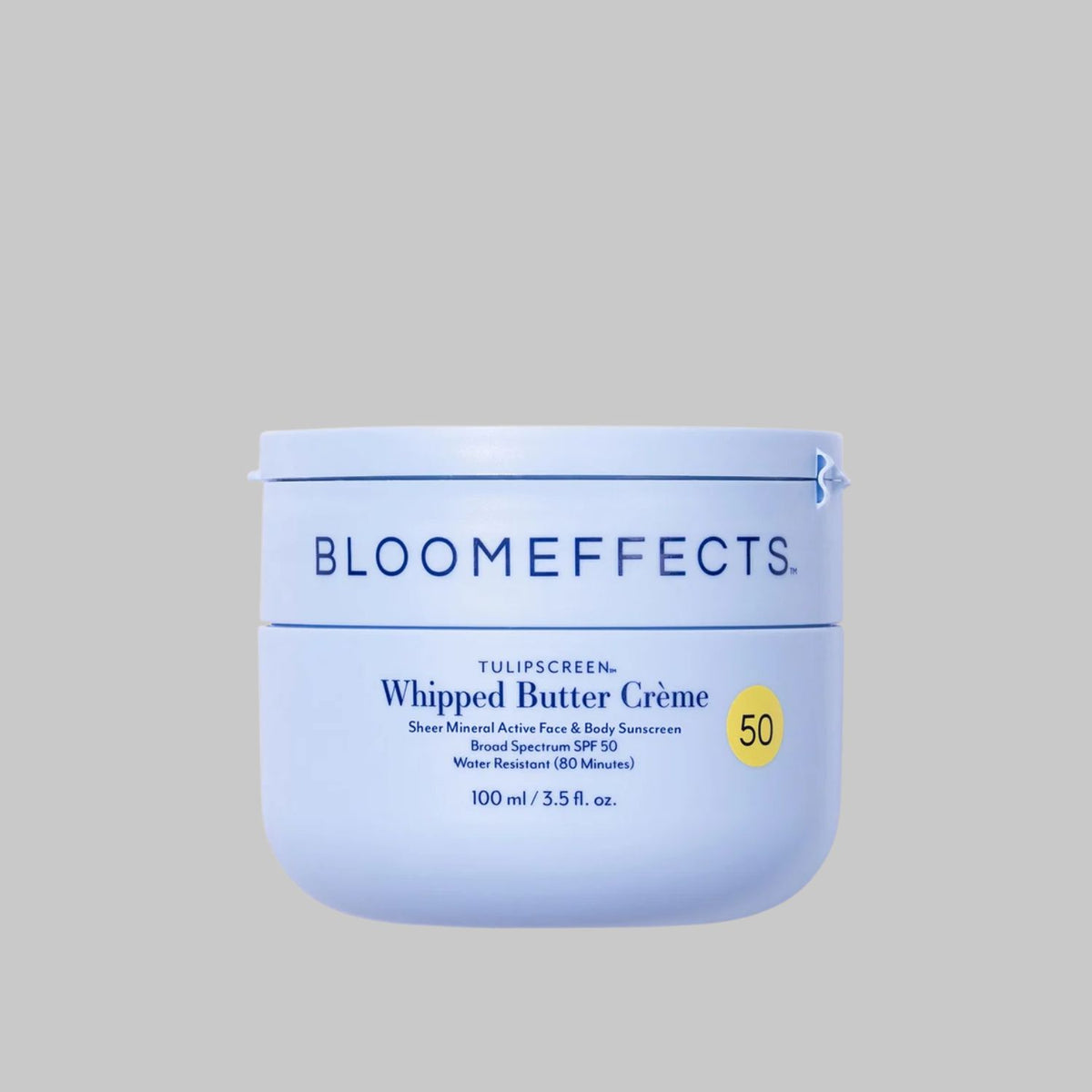 Bloomeffects Tulipscreen Whipped Butter Crème SPF 50 face and body mineral sunscreen in a pale blue jar.