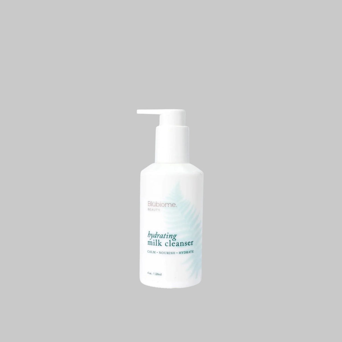 Blübiome Hydrating Milk Cleanser 120 ml white pump bottle on a gray background.