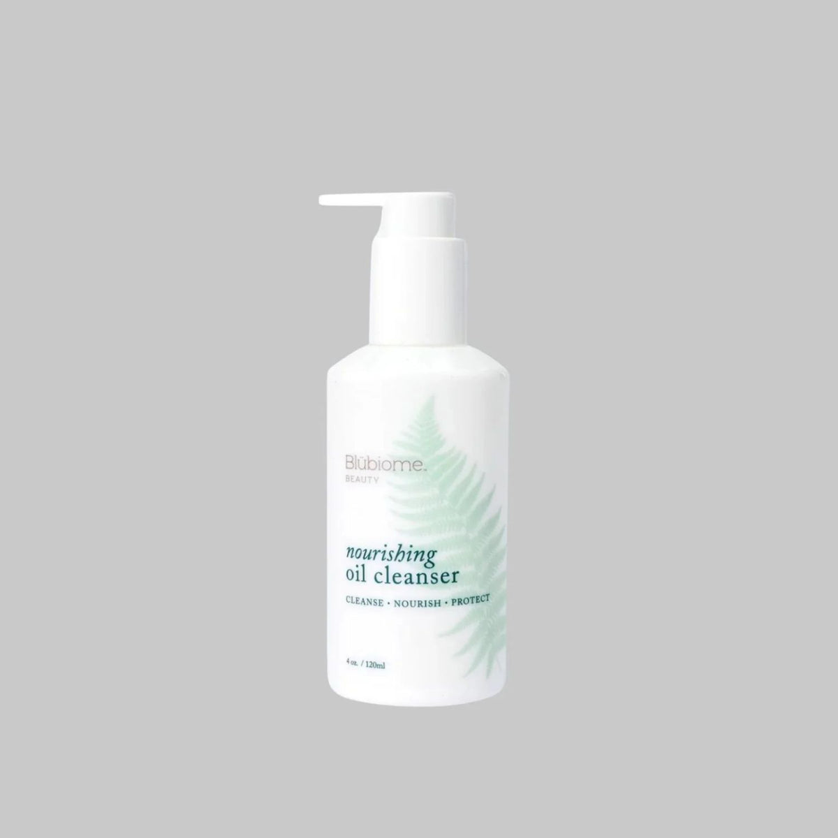 Blübiome Nourishing Oil Cleanser in a white 120 ml pump bottle on a gray background.