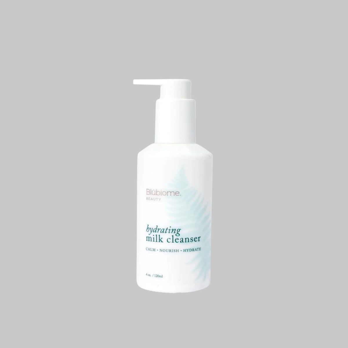 Blübiome Hydrating Milk Cleanser 120 ml white pump bottle on a gray background.