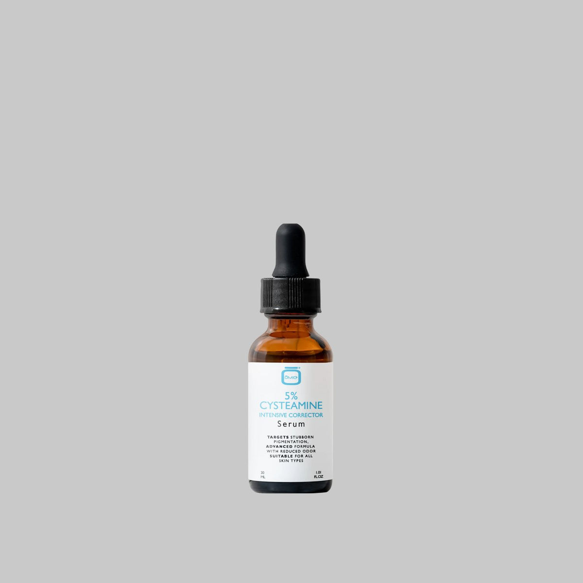 OMIC+ 5% Cysteamine Intensive Corrector Serum 30ml amber bottle with a black dropper on a gray background.